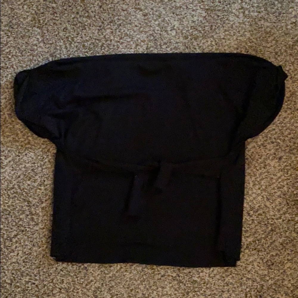 Solid black top from Express. Worn twice.